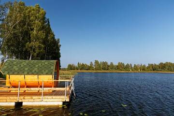 Фото номера Двухместный номер с 1 кроватью, вид на озеро Кемпинги Ezermala г. Valdemārpils 25
